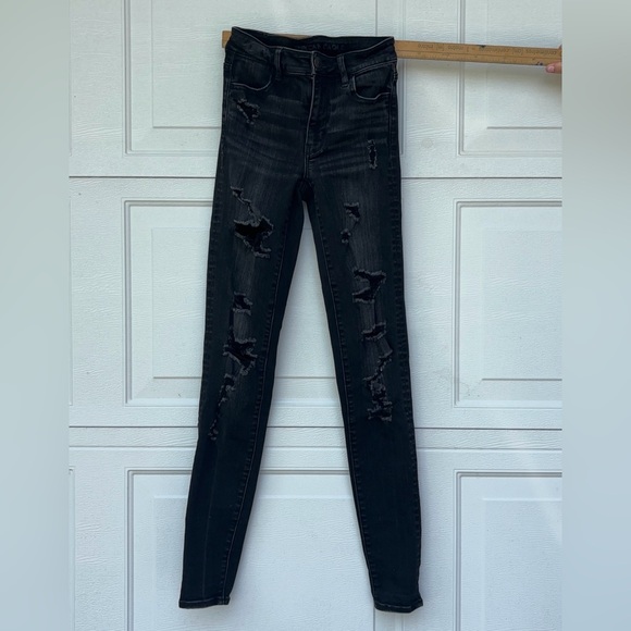 American Eagle Mid Rise Ripped Skinny Jeans
Size US 0 X-Long - Picture 1 of 2